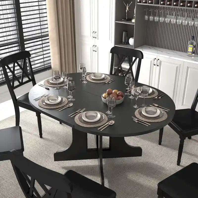 Mesa de comedor redonda moderna con tapa extensible y base en X para cenas familiares, espacios pequeños y estilismo multiambiente