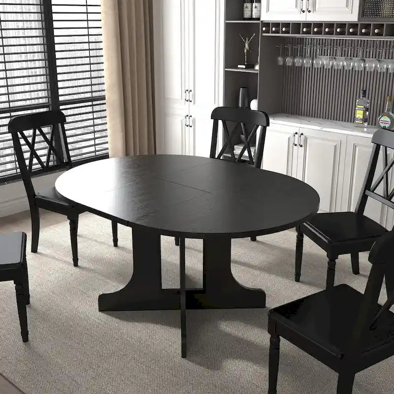 Mesa de comedor redonda moderna con tapa extensible y base en X para cenas familiares, espacios pequeños y estilismo multiambiente