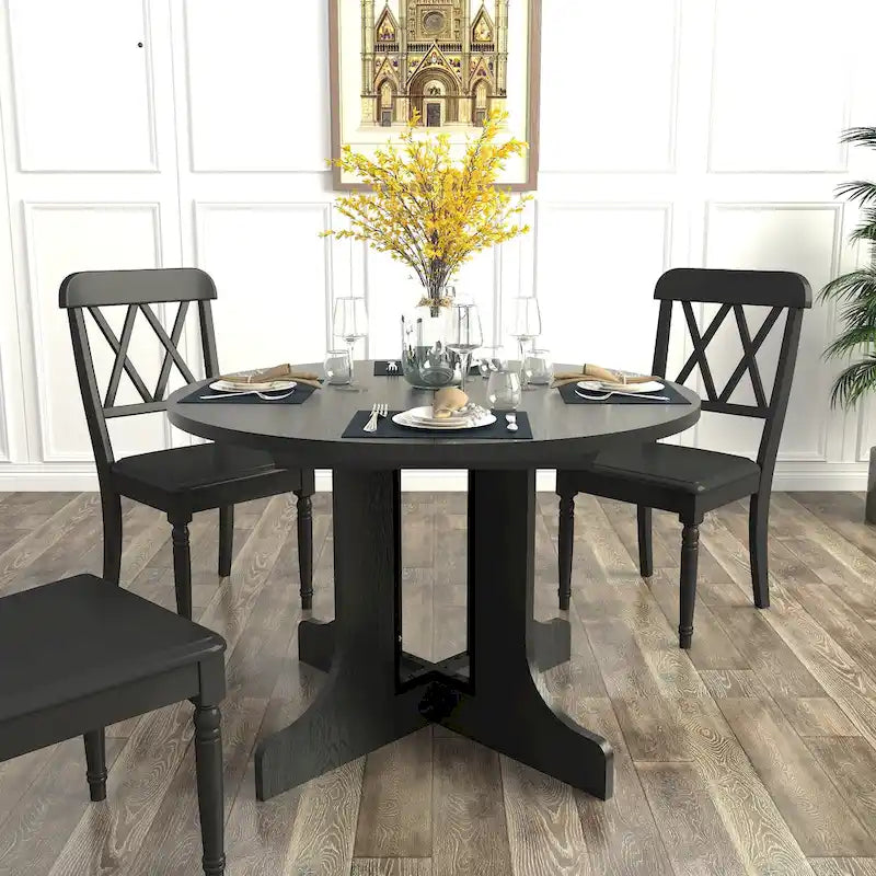 Mesa de comedor redonda moderna con tapa extensible y base en X para cenas familiares, espacios pequeños y estilismo multiambiente